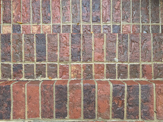 red brick steps wet with rain