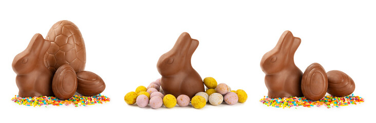 Easter chocolate bunny, chick and chocolate eggs isolated on white background. Chocolate eggs and other sweets. Easter celebration concept. Easter sweets on the table. Place for text. copy space.