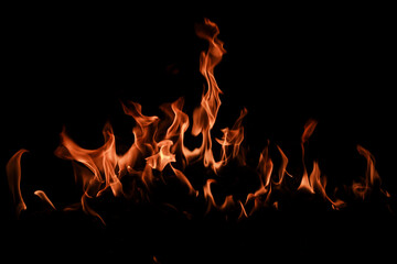 Texture of fire on black background. Hell bonfire. Texture of fire on a black background. Fire over black background. Fire over black background.