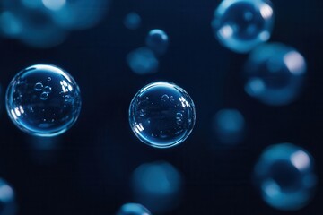 Beautiful blue bubbles floating in a dark space. Perfect for backgrounds, science themes, and creative design projects.