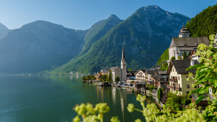 Stunning Hallstatt view with mountains and a serene lake reflecting morning light