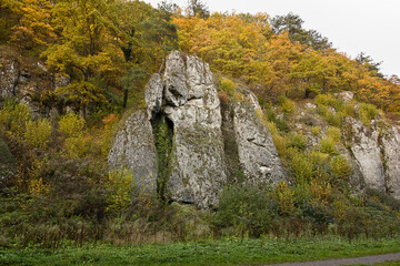 Autumn landscape with picturesque rocks in the forest. Nature of Poland