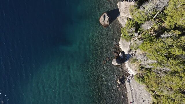 Aerial Drone Footage of Villa Traful, Patagonia, Argentina: Sunny Day with Turquoise Waters, Pines, and Rocks &ndash; Perfect for Social Media and Tourism Agencies
