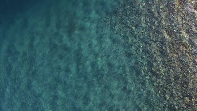 Aerial Drone Footage of Villa Traful, Patagonia, Argentina: Sunny Day with Turquoise Waters, Pines, and Rocks &ndash; Perfect for Social Media and Tourism Agencies