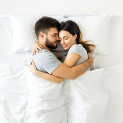 Fototapeta premium Lovely couple hugging each other in bed husband and wife sleeping together