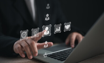 Human Resource Management (HR) concept: a businessman uses an interface for recruitment, leadership development, strategic customer targeting, company positions with precision and efficiency.