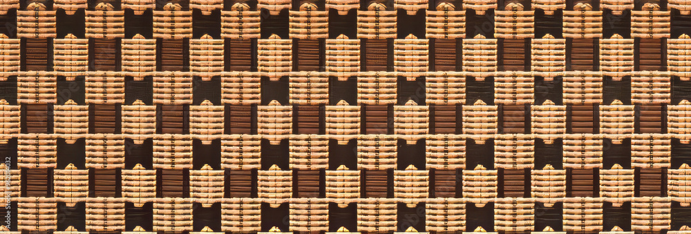 Poster checkered woven pattern. interlocking brown and beige woven design, creating a checkered pattern. pe