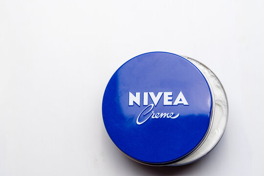a pot of German brand Nivea cream, isolated on a white background