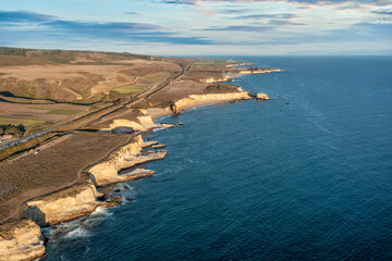 Beautiful landscape along Highway 1 in California. Pacific Ocean coastline along the bay, aerial...