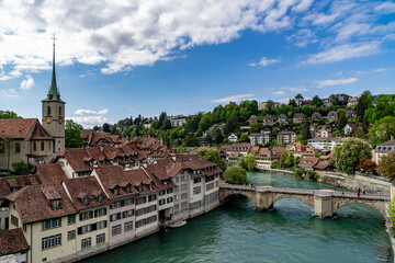 View of a church and a bridge over the Aare river in Bern, Switzerland