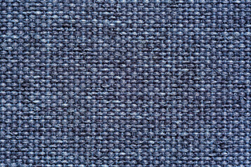 Gray macro fabric texture,Close-up texture of natural light gray coarse weave fabric or cloth. Fabric texture of natural cotton or linen textile material.