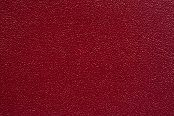 Red synthetic leather surface,Red synthetic leather for background. Background and pattern on the...
