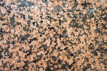 marbre nuance brun tacheté de noir et blanc