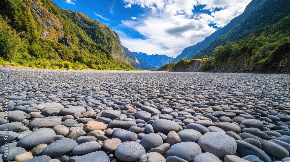 Poster a large field of rocks and boulders with a river running through it, ai