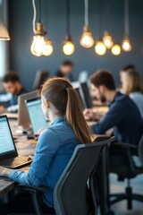 Young professionals working with laptops in a modern office space