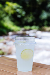 Lemon soda with sliced fresh lemon.