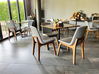 room interior with table and chairs, Modern white coffee shop interior with tables and chairs, Luxury dining room in a classic style