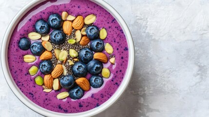 Colorful smoothie bowl topped with blueberries, nuts, and seeds, brain-boosting breakfast, vibrant and healthy meal