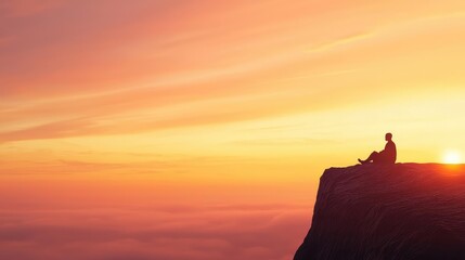 Fototapeta premium A lone figure sits on a cliff, gazing at a vibrant sunset over the horizon, reflecting tranquility and solitude in nature's beauty.