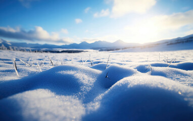 A serene winter landscape with glistening snow and a blue sky, creating a peaceful and tranquil atmosphere.