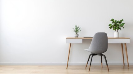 Minimalist workspace with a modern chair, sleek desk, and a single plant, promoting productivity