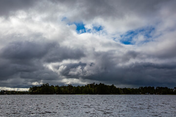 Cloudy, dark morning on a Wisconsin lake in August