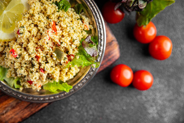 tabbouleh bulgur couscous with vegetables dish fresh delicious vegetarian and vegan food gourmet...