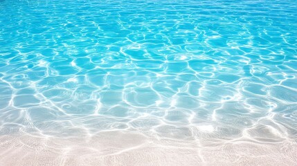 A tranquil blue sea with crystal-clear water gently lapping against a pristine sandy shore, perfect for relaxation and escape.