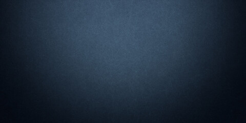 Dark blue background texture with black vignette in old vintage grunge textured border design, dark elegant teal color wall with light
