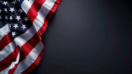 A close-up view of an American flag draped over the left side of a dark gray background. There is plenty of room on the right side for text or other elements.
