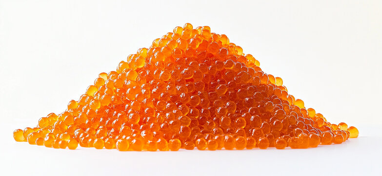 a pile of orange caviar on a white background