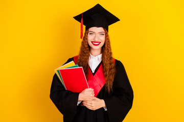 Photo of adorable lovely girl graduate wear black mantle read book college courses isolated on...