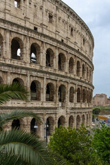 Fototapeta premium Roman Colosseum, the largest ancient amphitheatre ever built, Italy. Arches, exterior facade. Giardinetto del Monte Oppio. Rome, Italy