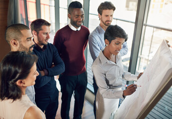 Group of people, presentation and diversity for collaboration, brainstorming and team in office meeting. Business, presenter and staff for session, workshop and discussion as colleagues with writing