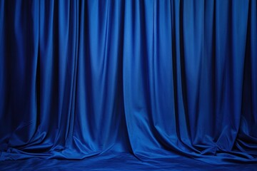 Elegant blue theater curtain background with luxurious drapery folds