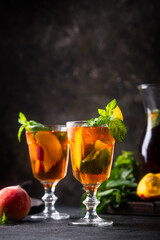 Cold ice tea with peach and mint