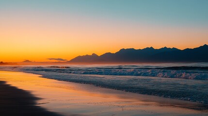 Fototapeta premium Sunset Over Mountain Range and Sandy Beach