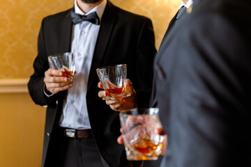 businessmen holding glass, men suits alcohol, whiskey glass, successful men concept, champagne welcome zone, cocktail, champagne, Top view, gala reception, Festive event, welcome drink,