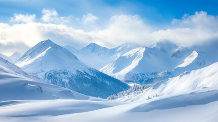 Snow-covered mountain range with blue sky and fluffy clouds.