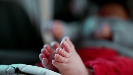 Close-up of baby’s tiny feet in focus, relaxed infant in car seat, soft and tender toes, cozy and peaceful atmosphere, intimate and loving moment, detailed view of newborn feet, calm and comfortable