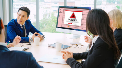 Fototapeta premium Cyber attacking concept. Malware alert showing on computer screen display scam and threat detection on computer system or online server to be removed snugly.