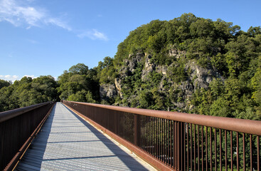 rosendale trestle surface view with Joppenbergh Mountain in the background (pedestrian and cyclist biking bike path) wallkill valley rail trail popular travel destination hudson valley rosendale