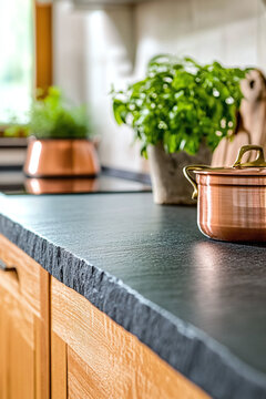 a soapstone countertop with a matte finish in the foreground, set against a softly blurred background of a rustic Italian-style kitchen, vertical photo
