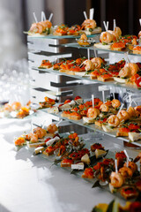catering banquet table, Assortment buffet, Catering set, various appetizers, Different canapes, meat specialities, Festive banquet table, delicious food, food snacks, catering wedding buffet,