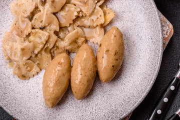 Fish or meat quenelles with delicate mushroom sauce, salt and spices
