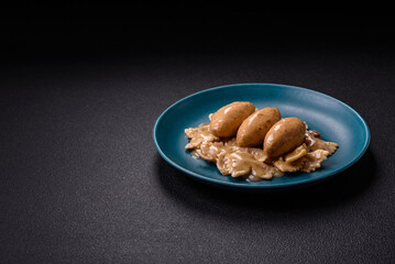 Fish or meat quenelles with delicate mushroom sauce, salt and spices