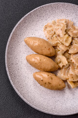 Fish or meat quenelles with delicate mushroom sauce, salt and spices