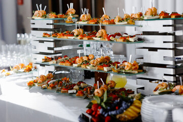 catering banquet table, Assortment buffet, Catering set, various appetizers, Different canapes, meat specialities, Festive banquet table, delicious food, food snacks, catering wedding buffet,