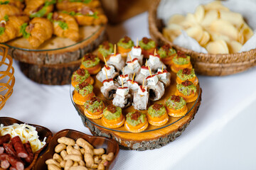 catering banquet table, Assortment buffet, Catering set, various appetizers, Different canapes, meat specialities, Festive banquet table, delicious food, food snacks, catering wedding buffet,