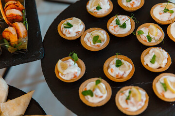 Assortment buffet, Different canapes, various snacks, Catering table, meat specialities, catering wedding buffet, beer bar, salty nuts, party or wedding, Celebration, gala reception, corporate